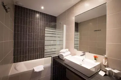 Salle de bains dans l'établissement Best Western Plus Hotel Plaisance