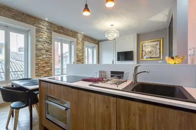 Cuisine ou kitchenette dans l'établissement Host Inn Natty Sūite