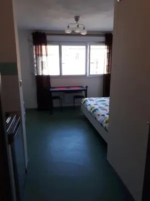 Un ou plusieurs lits dans un hébergement de l'établissement Part-Dieu Lyon Appart