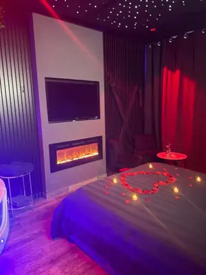 Un ou plusieurs lits dans un hébergement de l'établissement Loft, Studio and Love Rooms