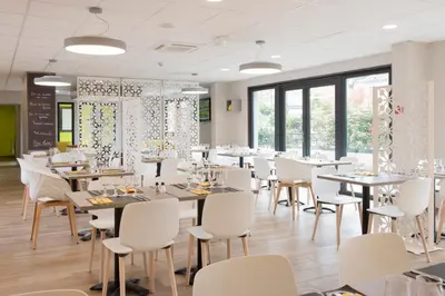 Restaurant ou autre lieu de restauration dans l'établissement Kyriad Saint-Etienne Centre