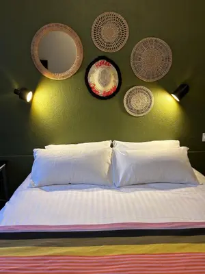 Un ou plusieurs lits dans un hébergement de l'établissement Hôtel de la Croix-Rousse