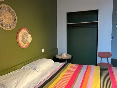 Un ou plusieurs lits dans un hébergement de l'établissement Hôtel de la Croix-Rousse