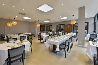 Restaurant ou autre lieu de restauration dans l'établissement Soleil et Jardin