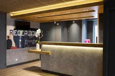 Coin salon dans l'établissement Ibis Budget Bourgoin Jallieu Centre