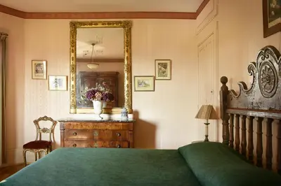 Un ou plusieurs lits dans un hébergement de l'établissement Château de Varambon - chambres d'hôtes et séminaires d'entreprise