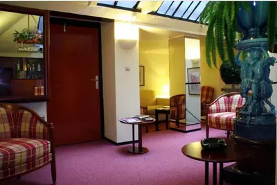 Coin salon dans l'établissement Hotel Elysée