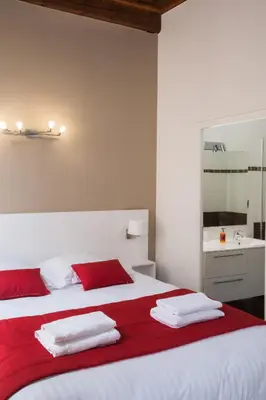 Un ou plusieurs lits dans un hébergement de l'établissement Lyon Cosy Stay