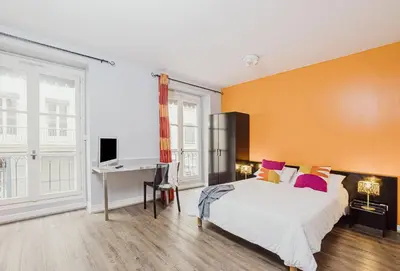 Un ou plusieurs lits dans un hébergement de l'établissement Residence Avy Baudelaire - Lyon Bellecour