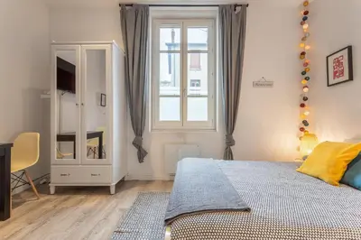 Un ou plusieurs lits dans un hébergement de l'établissement Le Cocon Lumière