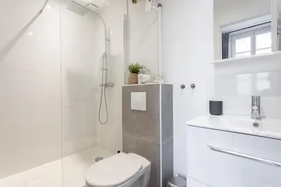 Salle de bains dans l'établissement Le Cocon Lumière