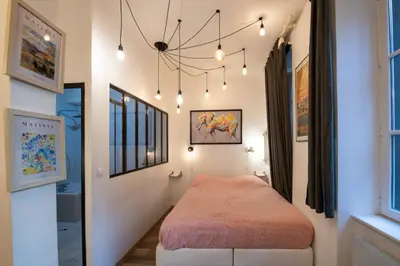 Un ou plusieurs lits dans un hébergement de l'établissement Suite du Vieux Lyon Cosy & calme - le Quarantaine
