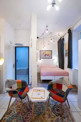 Un ou plusieurs lits dans un hébergement de l'établissement Suite du Vieux Lyon Cosy & calme - le Quarantaine