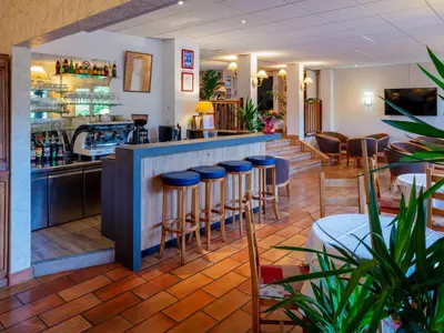 Restaurant ou autre lieu de restauration dans l'établissement Logis Hotel Noemys Morgon