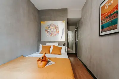 Un ou plusieurs lits dans un hébergement de l'établissement Hôtel Taggât
