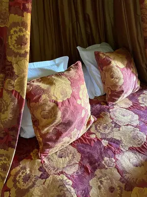 Un ou plusieurs lits dans un hébergement de l'établissement Château Chapeau Cornu