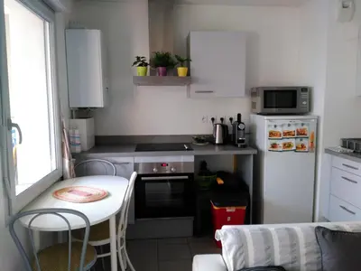 Cuisine ou kitchenette dans l'établissement Appartement F3 avec Parking privée