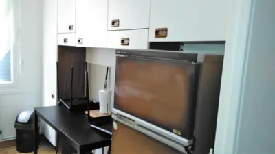 Télévision ou salle de divertissement dans l'établissement Bel appartement a vivre