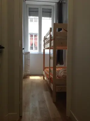 Un ou plusieurs lits dans un hébergement de l'établissement Charme et Modernité au Cœur de Lyon