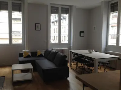 Coin salon dans l'établissement Charme et Modernité au Cœur de Lyon