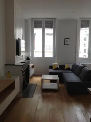 Coin salon dans l'établissement Charme et Modernité au Cœur de Lyon
