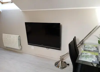 Télévision ou salle de divertissement dans l'établissement Loft à La Campagne