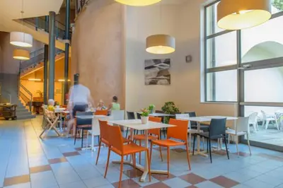 Coin salon dans l'établissement Appart Hôtel Belambra Lyon Villemanzy