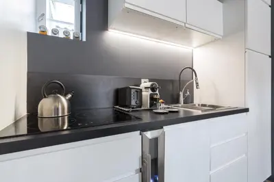 Cuisine ou kitchenette dans l'établissement La Suite Boissac - Cœur de Lyon - Bellecour