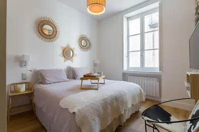 Un ou plusieurs lits dans un hébergement de l'établissement La Suite Boissac - Cœur de Lyon - Bellecour
