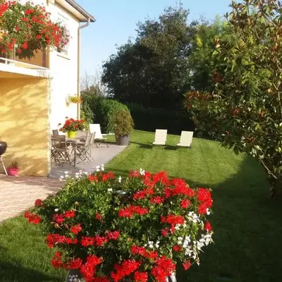 Ma maison fleurie proche AEROPORT LYON ST EXUPERY