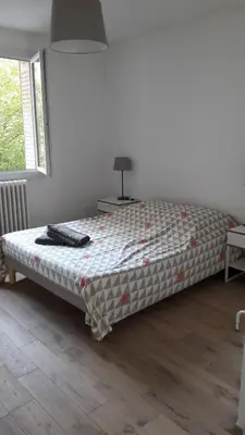 Un ou plusieurs lits dans un hébergement de l'établissement Modernité et design Part Dieu