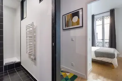 Un ou plusieurs lits dans un hébergement de l'établissement Hallmark - Furnished apartment - Downtown Lyon