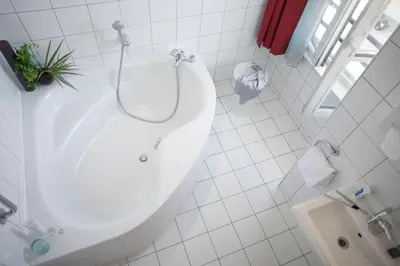 Salle de bains dans l'établissement Collège Hôtel