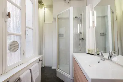 Salle de bains dans l'établissement Honorê - Suite Trois Maries