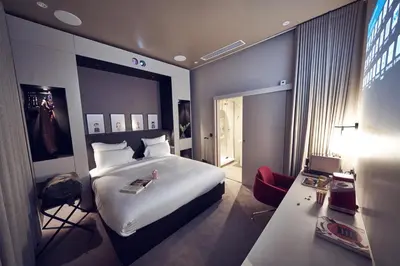 Un ou plusieurs lits dans un hébergement de l'établissement Maison Nô - Hôtel et Rooftop