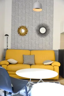 Coin salon dans l'établissement Cosy apartment ideally located in the Old Town