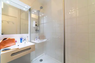 Salle de bains dans l'établissement Résidence Montempô Appart'Hôtel Lyon Part Dieu