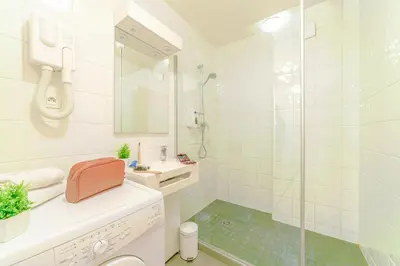 Salle de bains dans l'établissement Résidence Montempô Appart'Hôtel Lyon Part Dieu