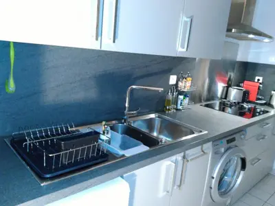 Cuisine ou kitchenette dans l'établissement Bel et spacieux appartement de 84 m² avec parking très proche du Métro Garibaldi