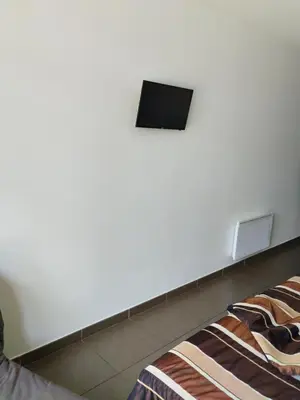 Télévision ou salle de divertissement dans l'établissement Gite de prejeurin