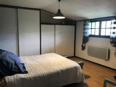 Un ou plusieurs lits dans un hébergement de l'établissement Maison LES BLEUETS