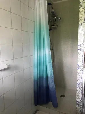 Salle de bains dans l'établissement Maison LES BLEUETS