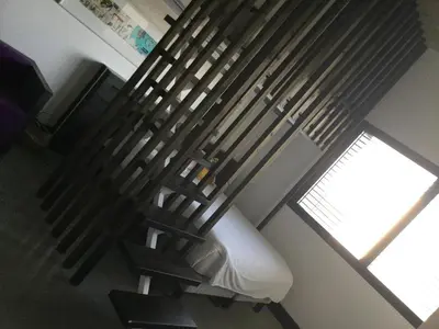 Coin salon dans l'établissement Le B Complexe Hôtel