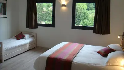 Un ou plusieurs lits dans un hébergement de l'établissement Côté Hôtel
