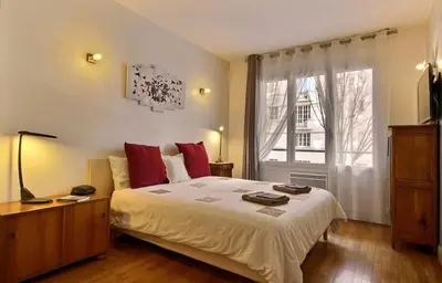 Un ou plusieurs lits dans un hébergement de l'établissement Lyon Superbe Appartement Parc Tête d'Or 95 M2 Clim Parking