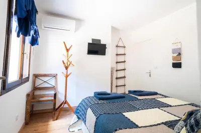 Un ou plusieurs lits dans un hébergement de l'établissement Lyon Mon Amour B&B