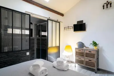 Un ou plusieurs lits dans un hébergement de l'établissement Lyon Mon Amour B&B