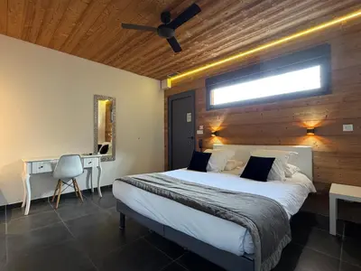 Un ou plusieurs lits dans un hébergement de l'établissement Bio-Motel