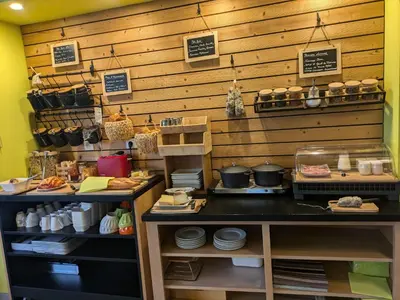 Cuisine ou kitchenette dans l'établissement Logis Hôtel Le Tisseur des Saveurs