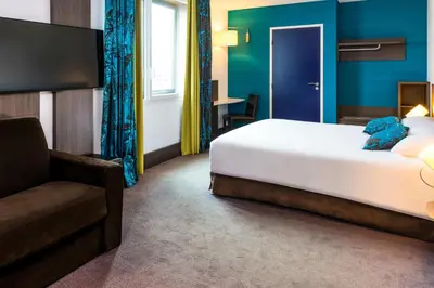 Un ou plusieurs lits dans un hébergement de l'établissement Ibis Styles Lyon Centre - Gare Part Dieu